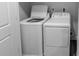Laundry room with a white washer and dryer set, offering convenient in-home laundry solutions at 2008 Main Nw St, Atlanta, GA 30318