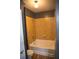 Bright bathroom features a tub with tile surround, adding a touch of warmth and style at 898 Oak Sw St # 1410, Atlanta, GA 30310