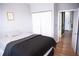 Cozy bedroom with neutral walls, plush carpeting, closet, and easy access to the hall at 898 Oak Sw St # 1410, Atlanta, GA 30310