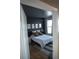 Cozy bedroom showcasing decorative pillows, rug, artwork and a pendant light fixture, creating a unique and stylish space at 898 Oak Sw St # 1410, Atlanta, GA 30310