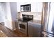Well-equipped kitchen features stainless steel appliances, granite countertops, and modern cabinetry at 898 Oak Sw St # 1410, Atlanta, GA 30310