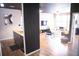 Bright living room boasts a large window, modern furniture, and views of the adjoining kitchen at 898 Oak Sw St # 1410, Atlanta, GA 30310
