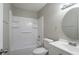 Bathroom featuring a tub/shower, vanity, toilet and mirror at 9090 Dorsey Rd, Riverdale, GA 30274