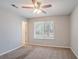 Bedroom with a ceiling fan and a window with blinds at 9090 Dorsey Rd, Riverdale, GA 30274
