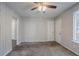 Spacious bedroom with soft carpet and neutral walls at 9090 Dorsey Rd, Riverdale, GA 30274