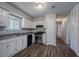 Updated kitchen with new countertops and appliances at 9090 Dorsey Rd, Riverdale, GA 30274