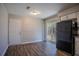 Well-lit kitchen with sliding glass door and essential appliances at 9090 Dorsey Rd, Riverdale, GA 30274