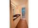 Bathroom features a large mirror, dual sinks, and elegant fixtures at 2030 Calmwater Ct, Suwanee, GA 30024