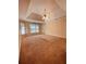 This bedroom is spacious and well-lit, featuring a unique trey ceiling at 2030 Calmwater Ct, Suwanee, GA 30024