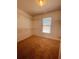 Walk-in closet has a large window and provides ample storage space at 2030 Calmwater Ct, Suwanee, GA 30024