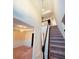 Elegant foyer featuring a staircase, chandelier, and formal dining room at 2030 Calmwater Ct, Suwanee, GA 30024