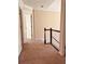 Hallway with carpet and a view of doors at 2030 Calmwater Ct, Suwanee, GA 30024