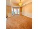 Inviting living room with bay windows offers a bright and cheerful ambiance at 2030 Calmwater Ct, Suwanee, GA 30024