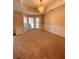 Inviting living room with ample natural light, perfect for gatherings and relaxation at 2030 Calmwater Ct, Suwanee, GA 30024