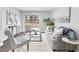 Stylish living room with comfortable seating, modern decor, and ample natural light at 6539 Hayes Dr, Riverdale, GA 30274