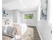 Inviting bedroom features a plush bed with soft textures and plenty of natural light at 6539 Hayes Dr, Riverdale, GA 30274