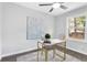 Bright home office space with a modern desk, chair, and a view of the outdoors at 6539 Hayes Dr, Riverdale, GA 30274