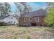 The backyard of this home provides an outdoor view with potential for landscaping or recreational amenities at 1579 Mayflower Sw Ave, Atlanta, GA 30311