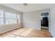 Bright dining room with hardwood floors, lots of natural light and view into kitchen at 1579 Mayflower Sw Ave, Atlanta, GA 30311