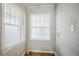 Bright kitchen nook featuring natural light from large windows with blinds at 1579 Mayflower Sw Ave, Atlanta, GA 30311