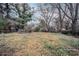 A large lot with mature trees presents a peaceful, natural setting and endless opportunities for customization at 1579 Mayflower Sw Ave, Atlanta, GA 30311