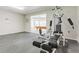 Finished basement featuring a workout area and billiard room with a pool table, perfect for recreation and fitness at 2660 Portabella Ln, Cumming, GA 30041