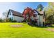 Charming two-story home with lush green lawn and beautiful landscaping in a suburban setting at 2660 Portabella Ln, Cumming, GA 30041