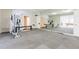Home gym featuring exercise equipment and mirrored wall at 2660 Portabella Ln, Cumming, GA 30041