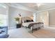Spacious bedroom with high ceilings, lots of natural light, and neutral decor at 2660 Portabella Ln, Cumming, GA 30041