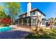 A lovely home features a gunite pool and a screened in porch with stone accents at 2660 Portabella Ln, Cumming, GA 30041