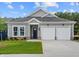 Charming single-Gathering home with a two-car garage, well-maintained lawn, and welcoming curb appeal at 408 Vinca Nw Cir, Kennesaw, GA 30144