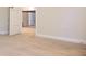 The hallway features neutral carpet, white walls, and wooden railings, creating a bright and open space at 651 Egrets Landing #53, Covington, GA 30014