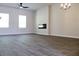 Spacious living room with hardwood flooring and lots of natural light at 651 Egrets Landing #53, Covington, GA 30014