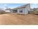 View of backyard with newly installed privacy fence and large grassy area at 7995 Brewton Creek Dr, Cumming, GA 30028