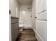 Clean, modern bathroom features a shower and a gray vanity with stylish fixtures at 642 Egrets Landing #66, Covington, GA 30014