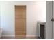 Bathroom featuring walk-in closet, cabinets, sink, and trim at 642 Egrets Landing #66, Covington, GA 30014