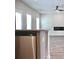 Modern kitchen with granite countertops and stainless steel dishwasher at 642 Egrets Landing #66, Covington, GA 30014