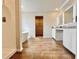 Bright bathroom with walk-in closet, soaking tub, tiled shower, and double vanity at 642 Egrets Landing #66, Covington, GA 30014