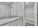 Bathroom featuring granite countertops, a single sink, and a separate toilet and shower area at 642 Egrets Landing #66, Covington, GA 30014