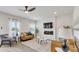 Inviting living room with stylish decor and ample natural light at 642 Egrets Landing #66, Covington, GA 30014