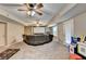Spacious finished basement with a large movie screen, game area, and ample space for recreation at 1229 Woodmere Dr, Loganville, GA 30052