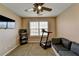 Cozy bedroom features neutral walls, soft carpet and a view from the window at 1229 Woodmere Dr, Loganville, GA 30052