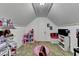 Bonus room with carpeted flooring, a window, shelving, and decor at 1229 Woodmere Dr, Loganville, GA 30052