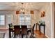 Dining room featuring a modern chandelier and stylish decor at 1229 Woodmere Dr, Loganville, GA 30052