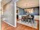 Elegant dining room with modern lighting and stylish decor, perfect for Gathering gatherings and entertaining at 1229 Woodmere Dr, Loganville, GA 30052