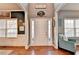 Bright foyer with hardwood floors, complemented by stylish decor and abundant natural light at 1229 Woodmere Dr, Loganville, GA 30052