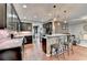 Kitchen featuring stainless steel appliances, granite counters, and barstool seating at counter at 1229 Woodmere Dr, Loganville, GA 30052