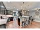 View of the kitchen featuring a breakfast bar, granite countertops, and stainless appliances at 1229 Woodmere Dr, Loganville, GA 30052