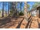 Lawn and trees in the backyard create a peaceful and natural setting at 2777 Luther Dr, Atlanta, GA 30344