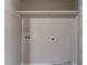 Laundry room with utility connections, a shelf for supplies, and ample space at 2777 Luther Dr, Atlanta, GA 30344